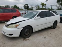 Salvage vehicles for parts for sale at auction: 2004 Toyota Camry LE