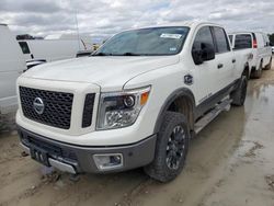 Salvage cars for sale from Copart Houston, TX: 2017 Nissan Titan XD SL