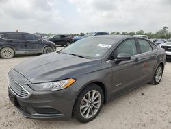 Salvage cars for sale from Copart Houston, TX: 2017 Ford Fusion SE Hybrid