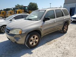 Salvage cars for sale from Copart Apopka, FL: 2002 Mazda Tribute LX