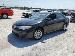 Salvage cars for sale from Copart Arcadia, FL: 2012 Toyota Camry Hybrid