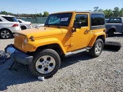 Salvage cars for sale from Copart Riverview, FL: 2014 Jeep Wrangler Sahara