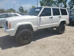 Salvage cars for sale from Copart Riverview, FL: 1999 Jeep Cherokee Sport