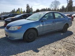 Salvage cars for sale from Copart Graham, WA: 2003 Toyota Camry LE