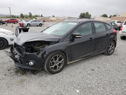 Salvage cars for sale from Copart Mentone, CA: 2014 Ford Focus SE
