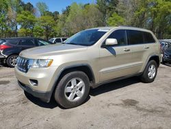 Salvage cars for sale at Austell, GA auction: 2011 Jeep Grand Cherokee Laredo