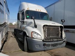 Salvage trucks for sale at Moraine, OH auction: 2013 Freightliner Cascadia 125