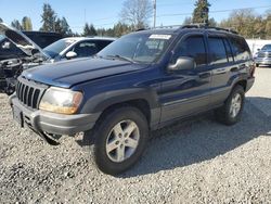 Salvage cars for sale from Copart Graham, WA: 2000 Jeep Grand Cherokee Laredo