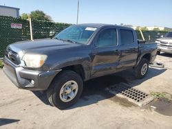 Salvage cars for sale from Copart Orlando, FL: 2015 Toyota Tacoma Double Cab Prerunner