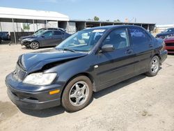 Salvage cars for sale at Fresno, CA auction: 2002 Mitsubishi Lancer OZ Rally