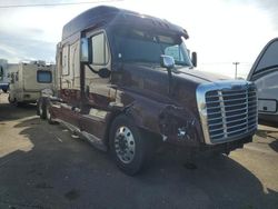Salvage trucks for sale at Moraine, OH auction: 2014 Freightliner Cascadia 125