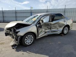 Carros salvage a la venta en subasta: 2014 Toyota Camry L