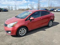 Salvage cars for sale from Copart Montreal Est, QC: 2012 KIA Rio LX