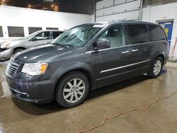 Salvage cars for sale from Copart Blaine, MN: 2011 Chrysler Town & Country Touring L