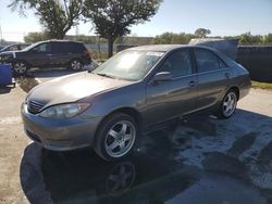 Salvage cars for sale at Orlando, FL auction: 2005 Toyota Camry LE