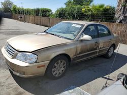 KIA salvage cars for sale: 2002 KIA Optima Magentis