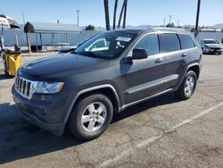 Jeep Grand Cherokee salvage cars for sale: 2011 Jeep Grand Cherokee Laredo