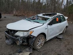 Salvage cars for sale from Copart Ontario Auction, ON: 2012 Toyota Camry Hybrid