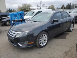 Salvage cars for sale from Copart Woodburn, OR: 2010 Ford Fusion SEL