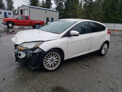 Salvage cars for sale from Copart Arlington, WA: 2013 Ford Focus Titanium