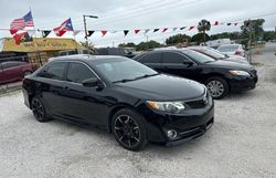 Salvage cars for sale from Copart Orlando, FL: 2014 Toyota Camry SE