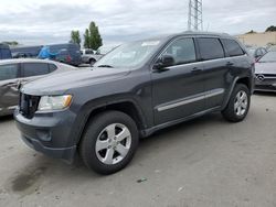 Salvage cars for sale from Copart Hayward, CA: 2011 Jeep Grand Cherokee Laredo