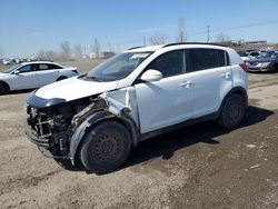 Salvage cars for sale from Copart Montreal Est, QC: 2011 KIA Sportage LX