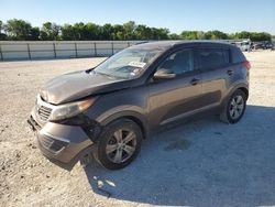 Salvage cars for sale from Copart New Braunfels, TX: 2012 KIA Sportage Base
