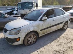 Flood-damaged cars for sale at auction: 2009 KIA Rio Base
