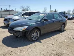 Salvage cars for sale from Copart Lansing, MI: 2015 Toyota Camry LE