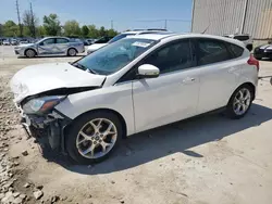 Salvage cars for sale at Lawrenceburg, KY auction: 2014 Ford Focus Titanium