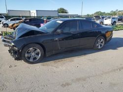Salvage cars for sale from Copart Orlando, FL: 2013 Dodge Charger SE