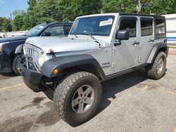 Salvage cars for sale at Eight Mile, AL auction: 2011 Jeep Wrangler Unlimited Sport