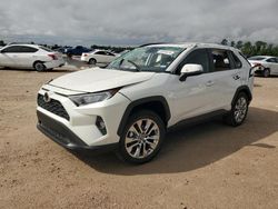 Salvage cars for sale from Copart Houston, TX: 2021 Toyota Rav4 XLE Premium