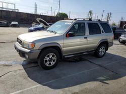 Salvage cars for sale from Copart Wilmington, CA: 2000 Nissan Pathfinder LE