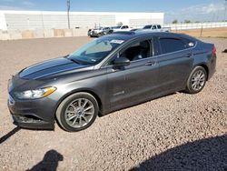 Salvage cars for sale at Phoenix, AZ auction: 2017 Ford Fusion SE Hybrid