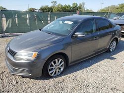 Salvage cars for sale from Copart Riverview, FL: 2011 Volkswagen Jetta SE