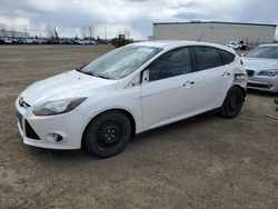 Salvage cars for sale from Copart Rocky View County, AB: 2014 Ford Focus Titanium