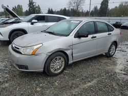 Salvage cars for sale from Copart Graham, WA: 2009 Ford Focus SE