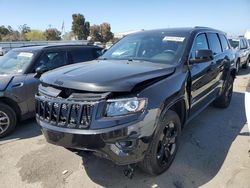 Jeep Grand Cherokee salvage cars for sale: 2014 Jeep Grand Cherokee Laredo