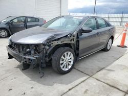 Salvage cars for sale from Copart Farr West, UT: 2014 Toyota Camry Hybrid