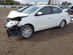 Salvage cars for sale from Copart Bowmanville, ON: 2014 Nissan Versa S