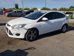 Salvage cars for sale from Copart Miami, FL: 2013 Ford Focus SE
