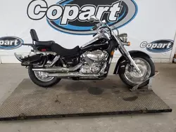 Salvage motorcycles for sale at Grand Prairie, TX auction: 2014 Honda VT750 C