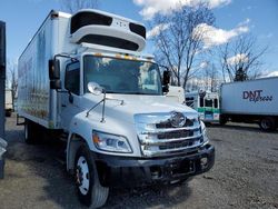 Salvage trucks for sale at Central Square, NY auction: 2022 Hino 258 268