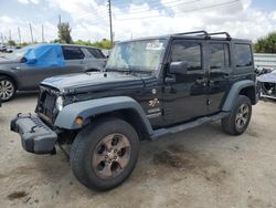Salvage cars for sale from Copart Miami, FL: 2015 Jeep Wrangler Unlimited Sport