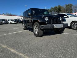 Salvage cars for sale at North Billerica, MA auction: 2014 Jeep Wrangler Unlimited Sahara