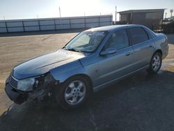 Salvage cars for sale from Copart Fresno, CA: 2004 Saturn L300 Level 2