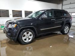 Salvage cars for sale from Copart Blaine, MN: 2013 Jeep Grand Cherokee Laredo