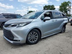 Salvage cars for sale at Riverview, FL auction: 2021 Toyota Sienna XLE